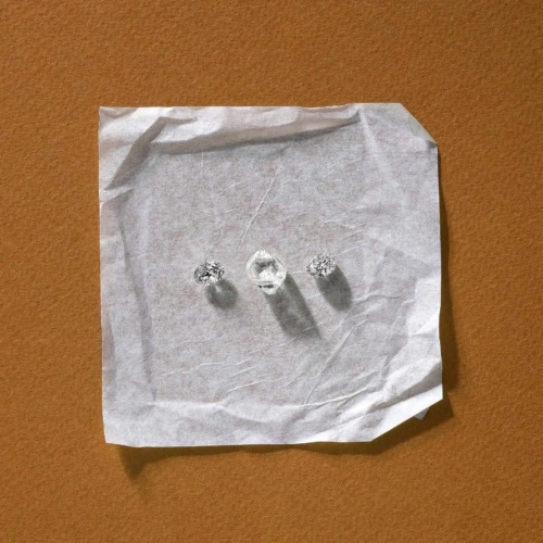 Diamonds on white square with rust background