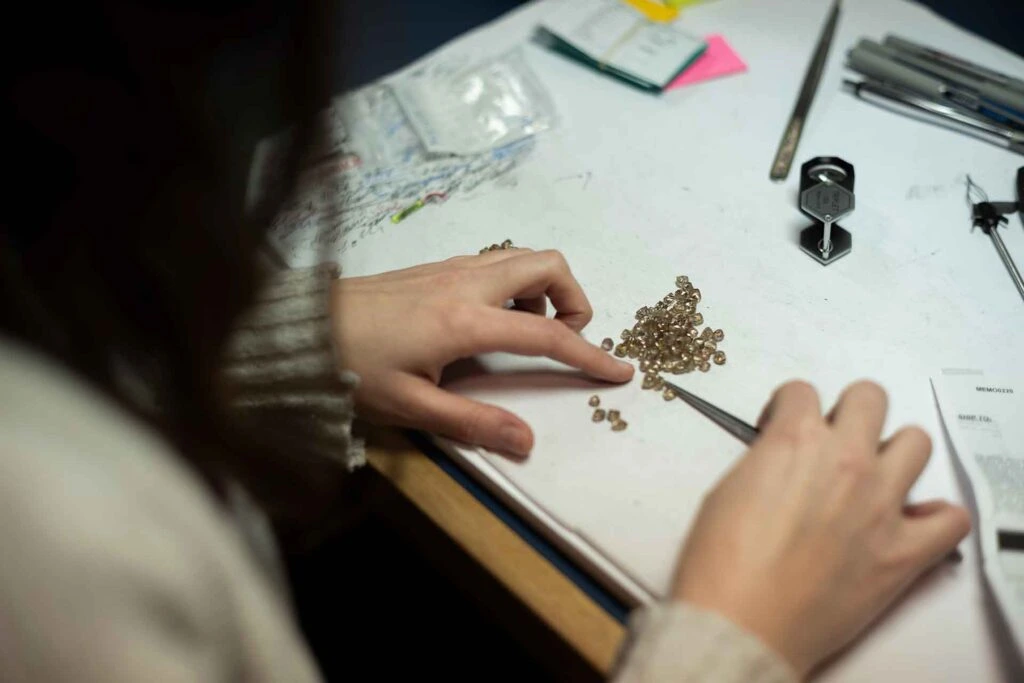 Woman checking diamonds