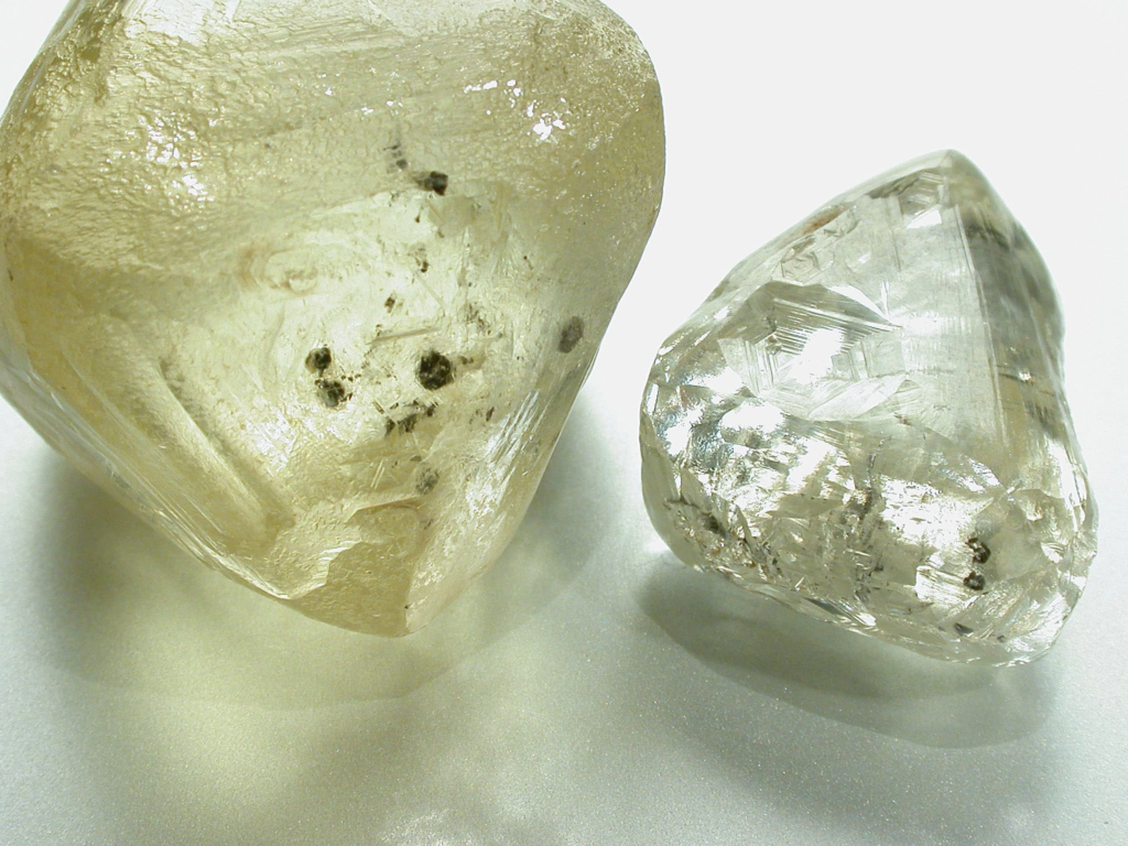 Two rough, uncut natural diamonds