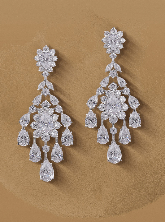 A pair of natural diamond earrings