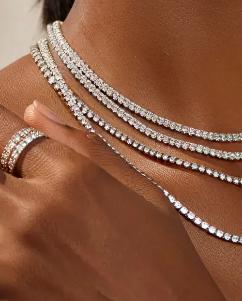 Close up of a woman wearing natural diamond jewellery