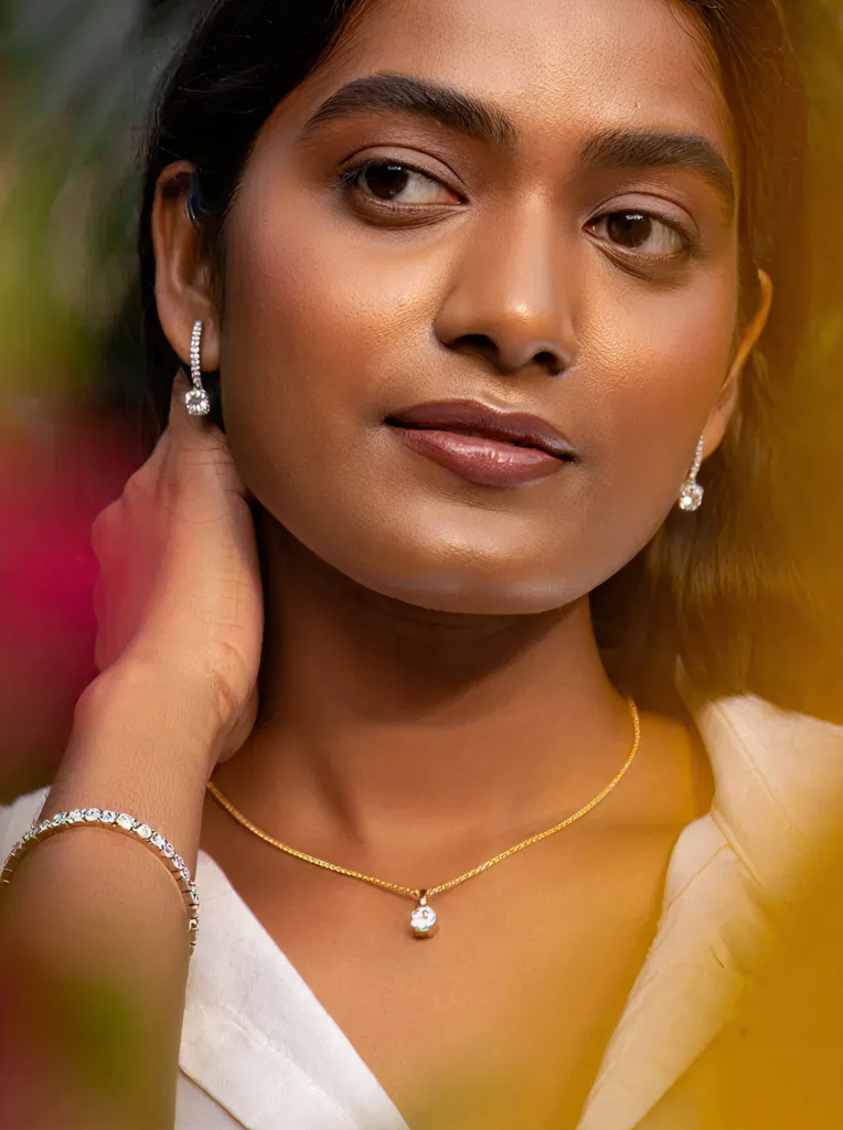 Woman wearing natural diamond jewellery