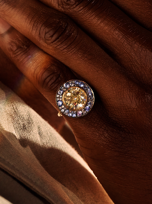 Close up of a honey Desert diamond ring