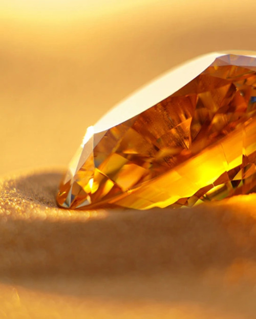 A honey Desert diamond in the sand