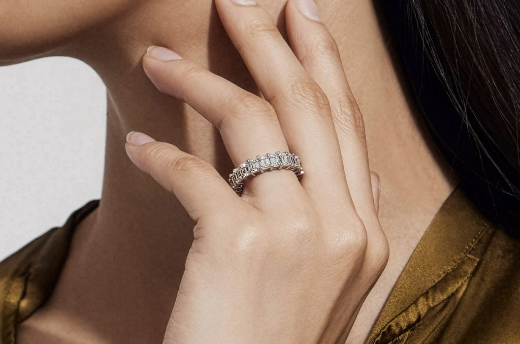 Close up of a hand with a natural diamond ring