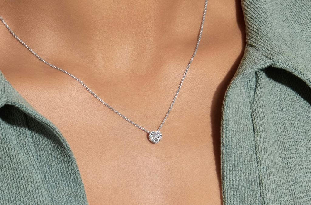 Close up of a natural diamond heart shaped pendant