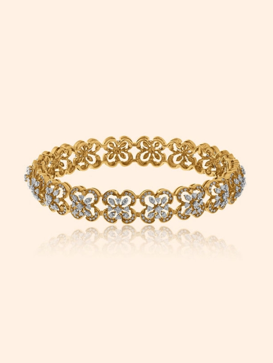 An ornamental natural diamond bangle