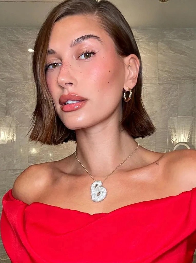 Hailey Bieber wearing a diamond pendant