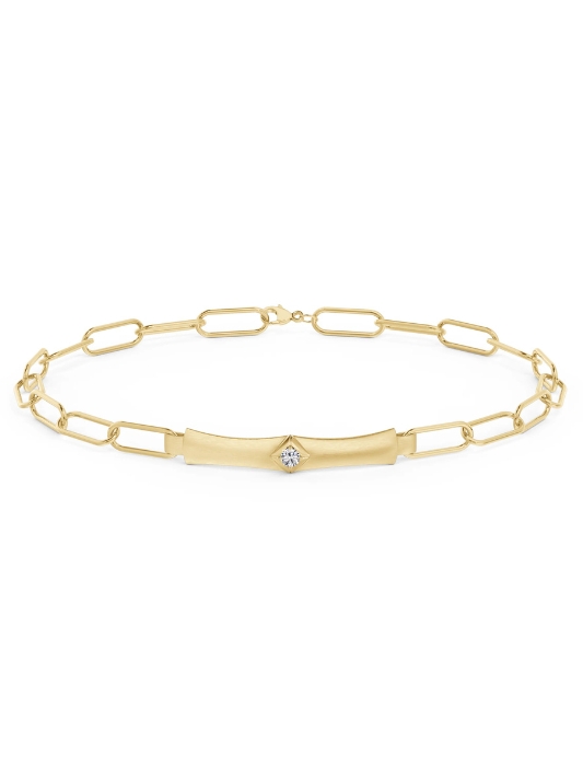 A gold and diamond bracelet