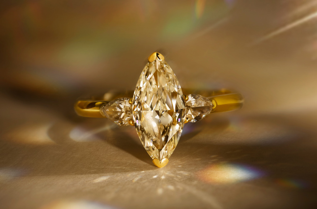 A marquise cut natural diamond ring