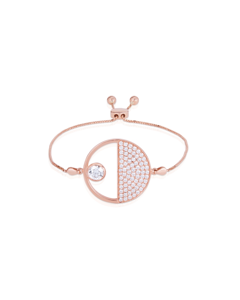 A pave and solitaire diamond bracelet in rose gold with an adjustable strap