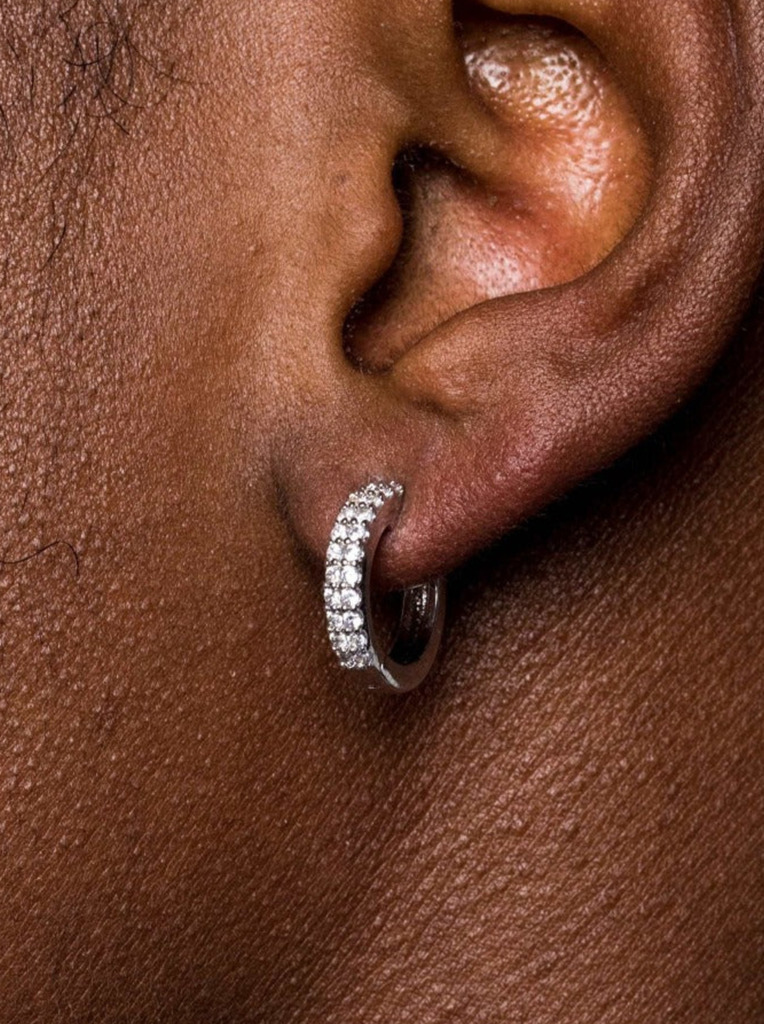 Close up of a man's diamond hoop