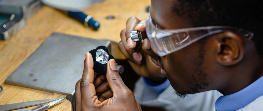 Man examining a natural sustainable diamond