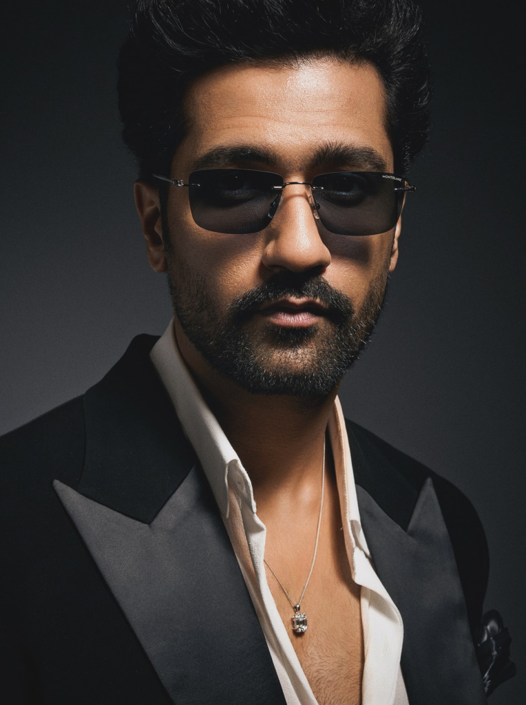 Vicky Kaushal wearing a diamond solitaire pendant