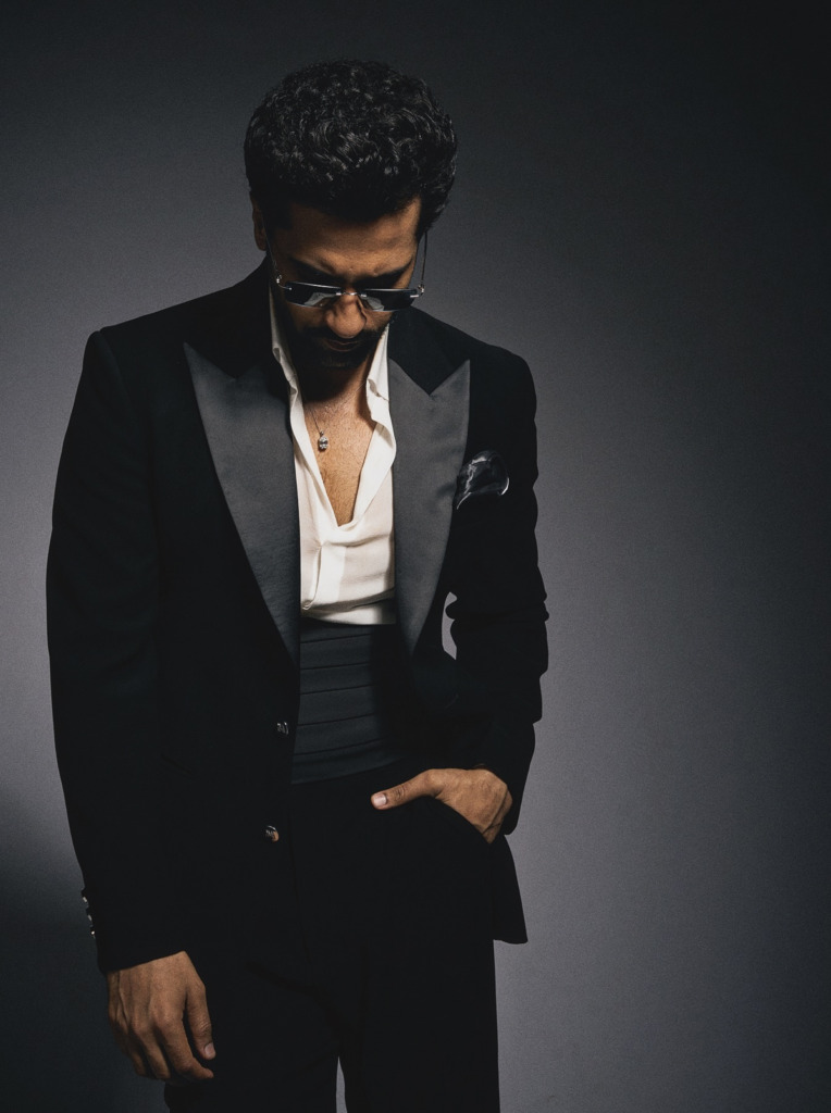 Vicky Kaushal wearing a diamond solitaire pendant