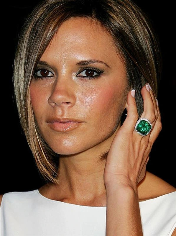 Victoria Beckham wearing a large emerald ring