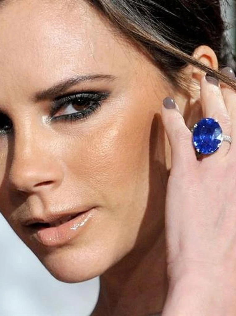 Victoria Beckham wearing a large sapphire ring
