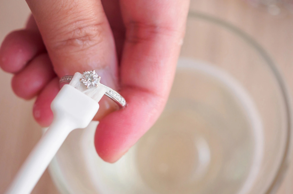 Diamond ring being gently cleaned