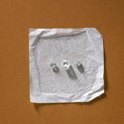 Diamonds on white square with rust background