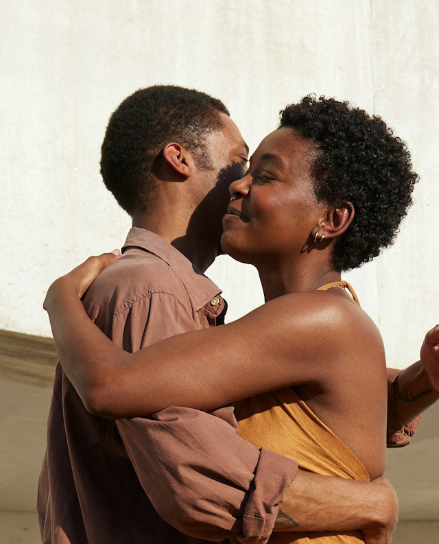 A couple embracing outside