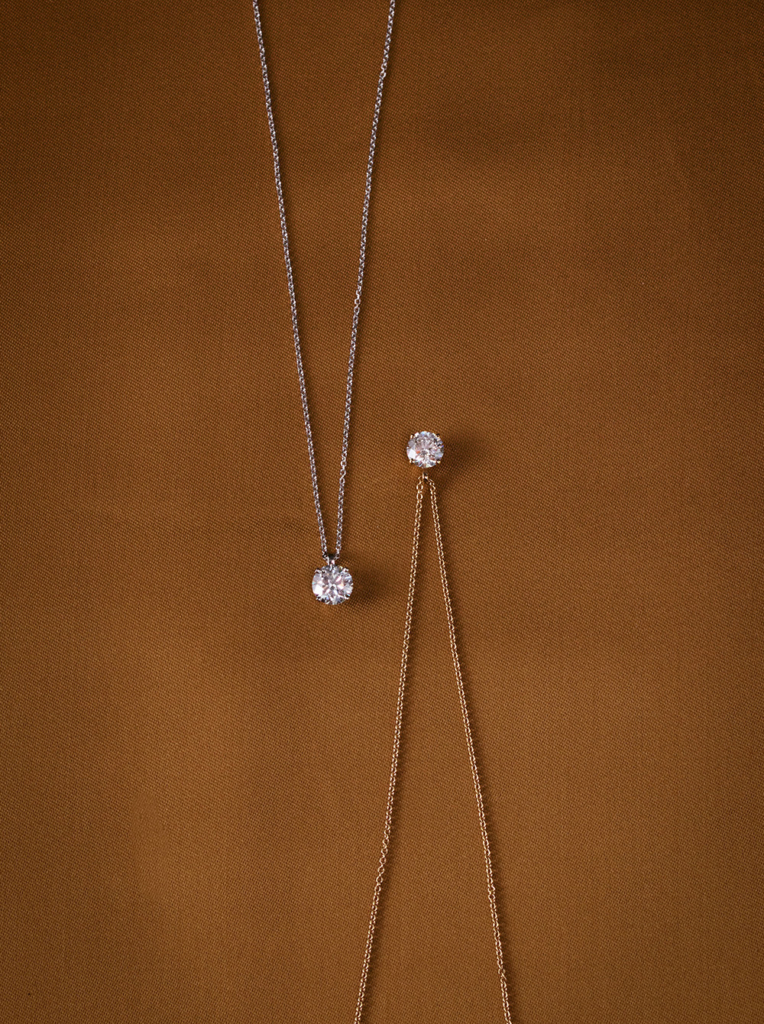 Single diamond pendant necklaces