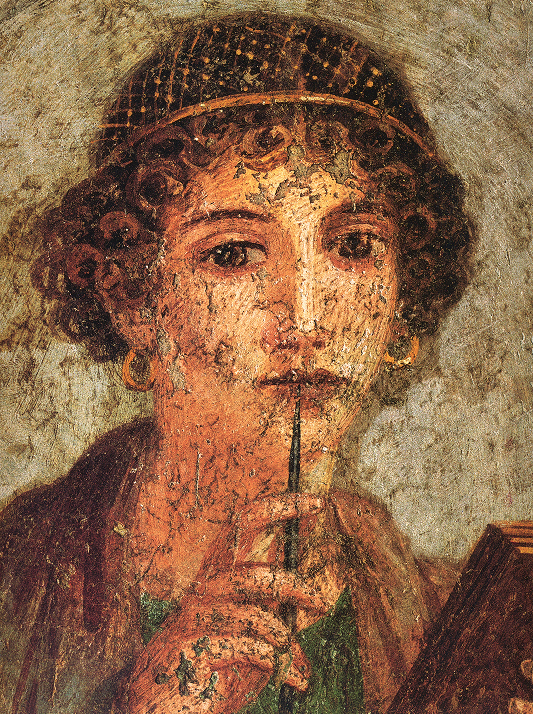 Ancient Roman fresco of a woman holding a stylus and wax tablet, painted in warm ochre and earthy tones that highlight the natural pigments used in classical art.