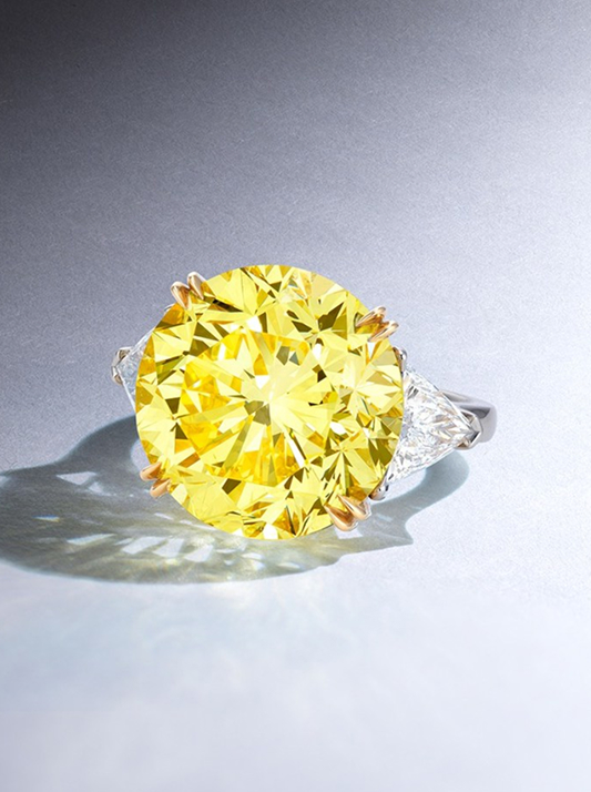 A 15.51-carat Fancy Vivid Yellow Diamond Ring that sold for $1.1 million at Phillips