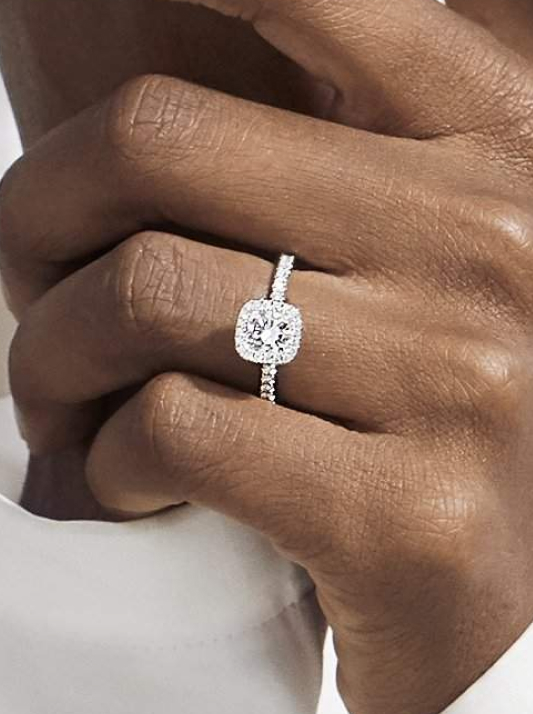 A halo-style engagement ring