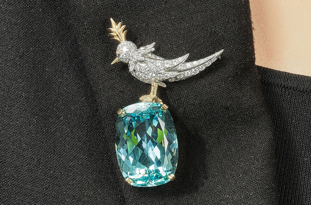 A diamond encrusted bird brooch