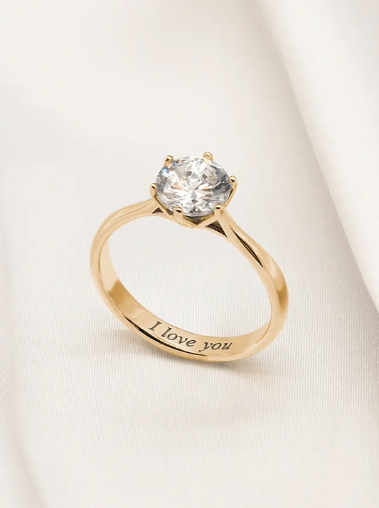 A natural diamond engagement ring that's engraved
