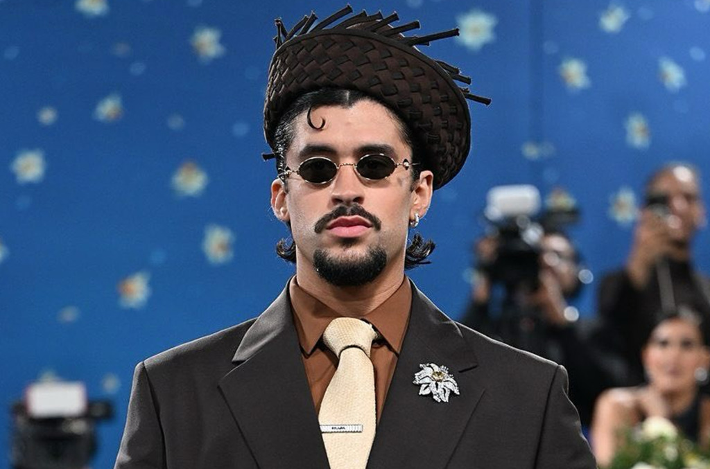 Bad Bunny wearing a diamond brooch