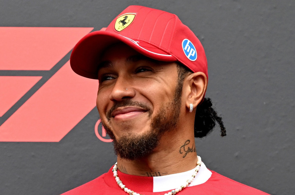 Lewis hamilton wearing diamond earring and necklace