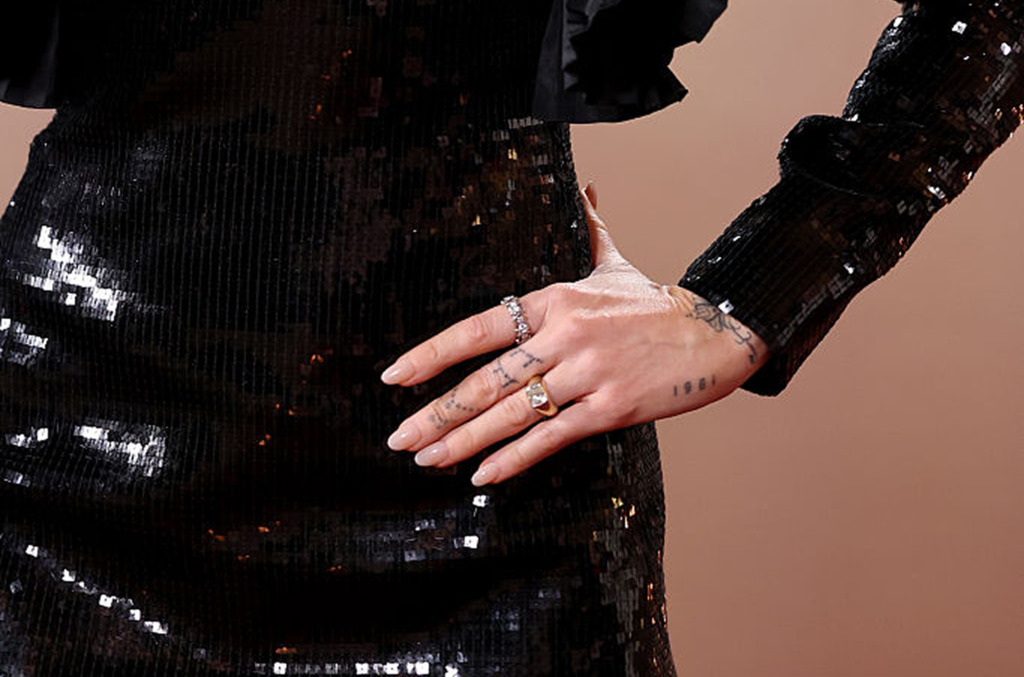 Miley Cyrus's cushion cut natural diamond ring