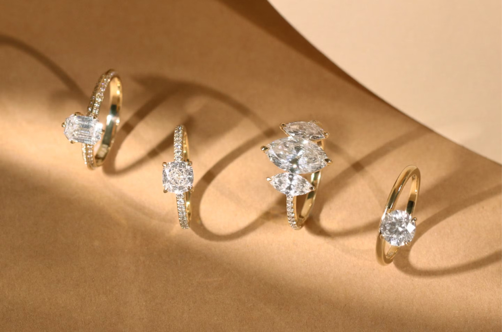 Article 55 How To Buy An Engagement Ring Image 1 Flat Lay Of Mixed Jewelry Styles   Image Library