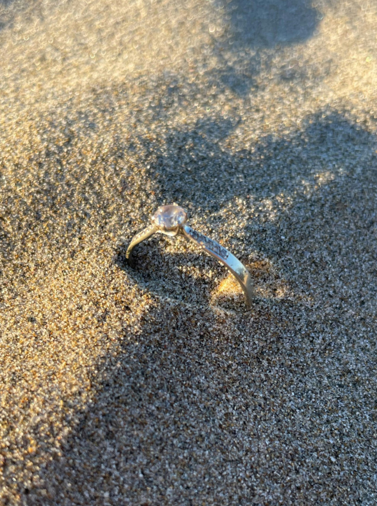 diamond ring in sand