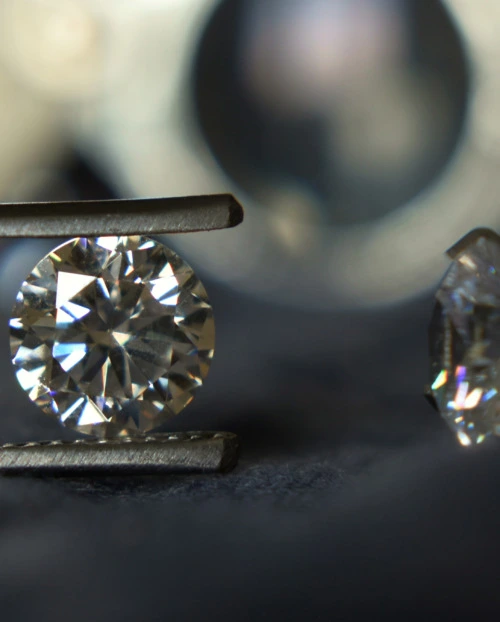 Natural diamond beside gemological tools Lead Image