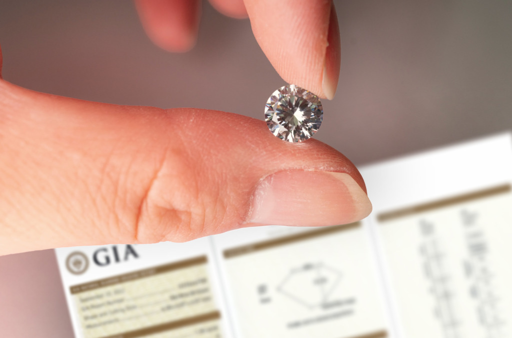 a GIA certificate next to a natural diamond