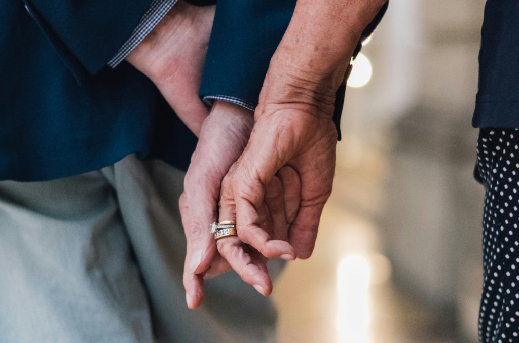 old couple with diamond ring