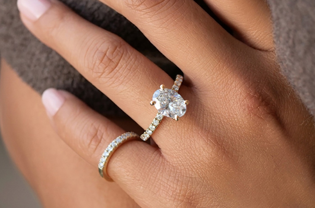 oval engagement ring with a full pave band