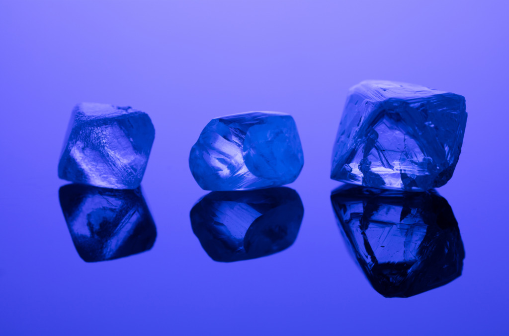 Fluorescent natural diamonds until UV light Voyage Through the Diamond Realm 
