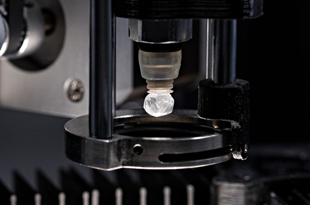 rough diamond being scanned and matched to its original record